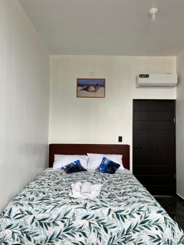 Una cama o camas en una habitación de La Casa D Juan
