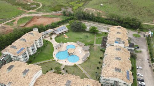 an aerial view of a house with a pool at Village Aldeia das Águas in Barra do Piraí