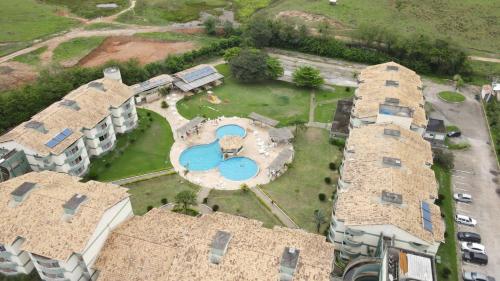 an aerial view of a house with a pool at Village Aldeia das Águas in Barra do Piraí