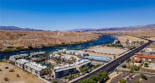 an aerial view of a city next to a river at Relaxation on the Colorado River in Bullhead City