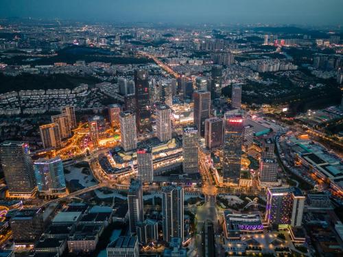 an aerial view of a city at night at Sheraton Guangzhou Panyu in Guangzhou
