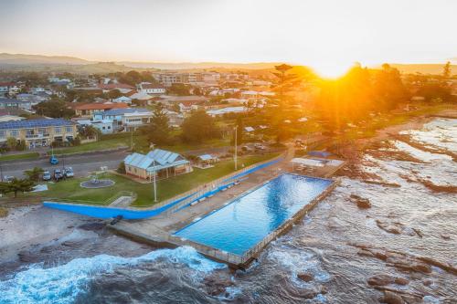 an overhead view of a pool in a river at Seaside Village Retreat in Shellharbour