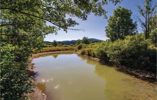 a view of a river from a bridge at Two-Bedroom Apartment In Ogulin in Jasenak