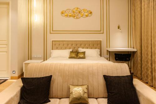 Ένα ή περισσότερα κρεβάτια σε δωμάτιο στο Leela residence studio apartment near Manyata tech park and airport