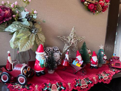 a group of christmas decorations on a table at Ryoso Chatani in Kyoto