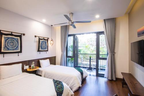 Katil atau katil-katil dalam bilik di Casa Vanilla Mang Den