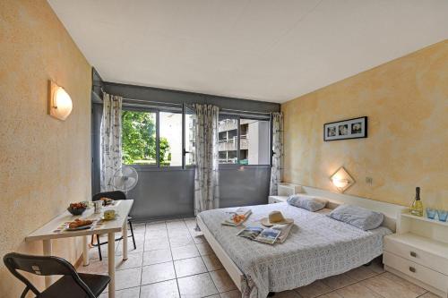 Katil atau katil-katil dalam bilik di Chiasso Apartments