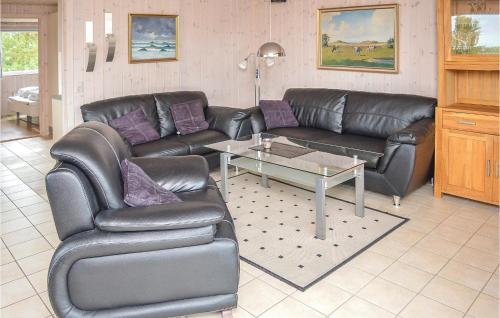 Posezení v ubytování Three-Bedroom Holiday Home In Romo