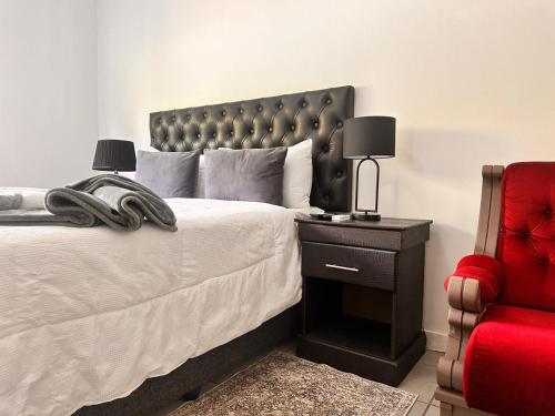 Ένα ή περισσότερα κρεβάτια σε δωμάτιο στο Creekside Guest House Middelburg
