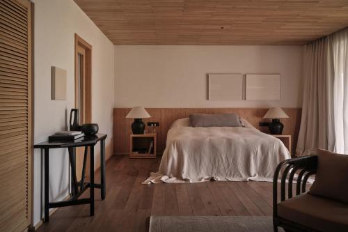 Postel nebo postele na pokoji v ubytování DAGI Dali Resort