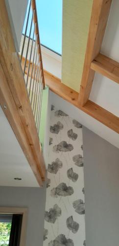 a staircase in a house with a mural of turtles at Ferienhaus Katharina - Urlaub Unter den Klippen in Lügde