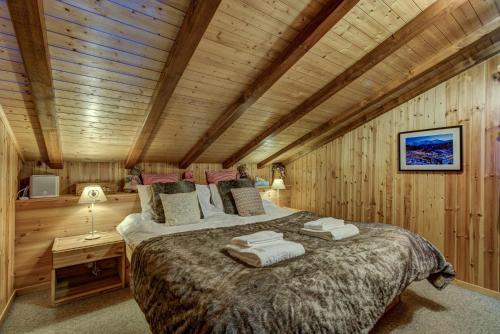 Ένα ή περισσότερα κρεβάτια σε δωμάτιο στο Chalet d'Arbi