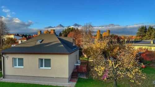a house with a view of the mountains at StoneMlynska 7 Slovakia in Svit