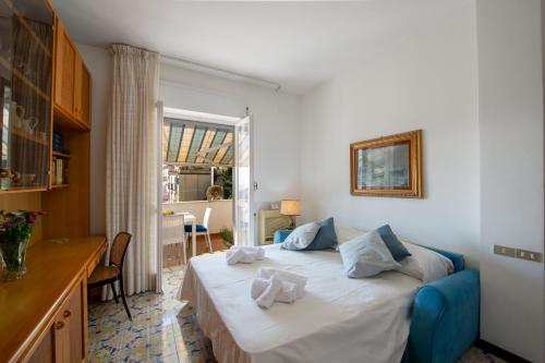 Ένα ή περισσότερα κρεβάτια σε δωμάτιο στο Casa Bibi - Maiori - Amalfi coast