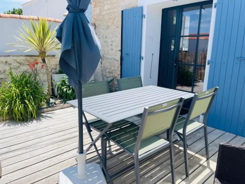 Balkón nebo terasa v ubytování Clos des Aigrettes -6 Gîtes de charme et confort à 30m du Port de La Cotinière