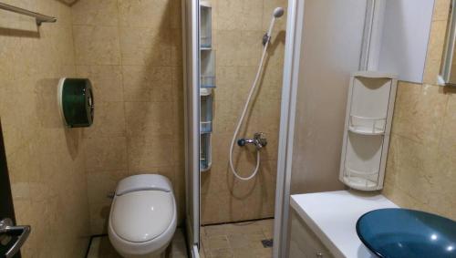 Koupelna v ubytování 永春棧Kozzy Apartment