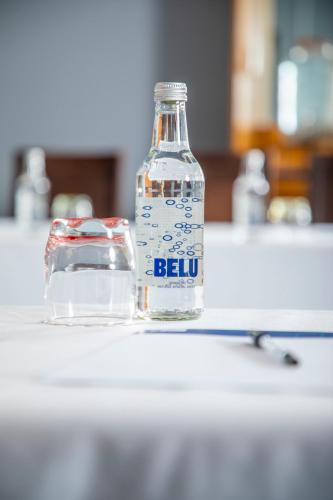 a bottle of water sitting on top of a counter at Holiday Inn Express Royal Docks by IHG in London