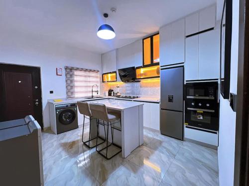 Kuchyň nebo kuchyňský kout v ubytování a3 nes luxury apartment