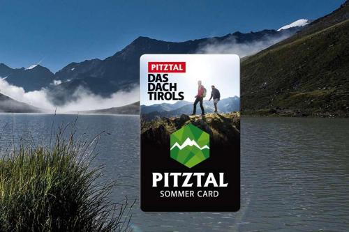 a sign on the side of a body of water at Bäckerei Schranz in Sankt Leonhard im Pitztal