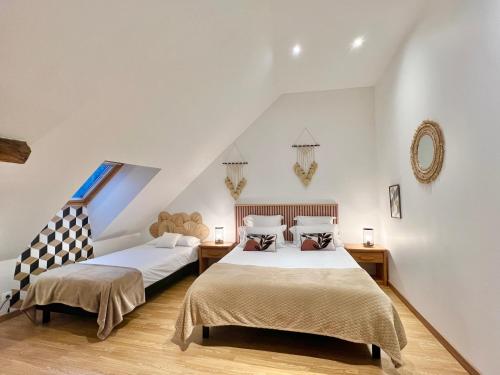 Postel nebo postele na pokoji v ubytování LA VUE LOIRE Maison