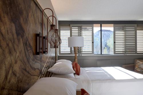 a bedroom with two beds and a window at Phoenix Marriott Resort Tempe at The Buttes in Tempe