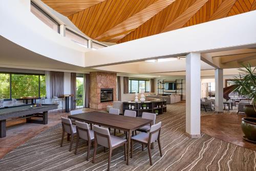 an open living room with a ping pong table at Phoenix Marriott Resort Tempe at The Buttes in Tempe