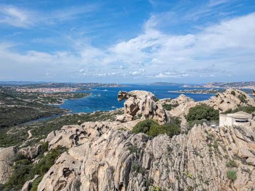 a view from the top of a rocky mountain at Felix Hotels - Residence Hotel Costa Serena in Palau