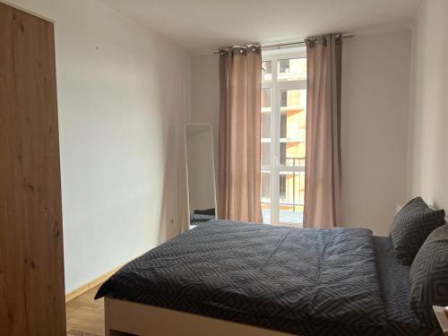 Кровать или кровати в номере Apartments VIP AVALON