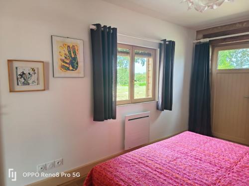 Postel nebo postele na pokoji v ubytování La Grande Terrasse