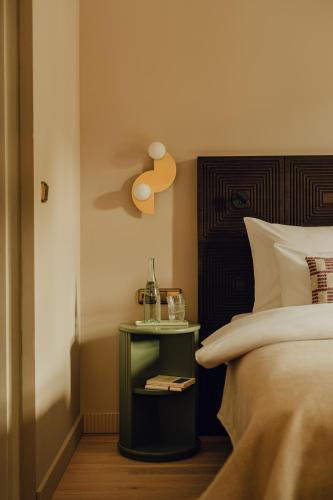 Postel nebo postele na pokoji v ubytování Design Apartments zum Hirschen