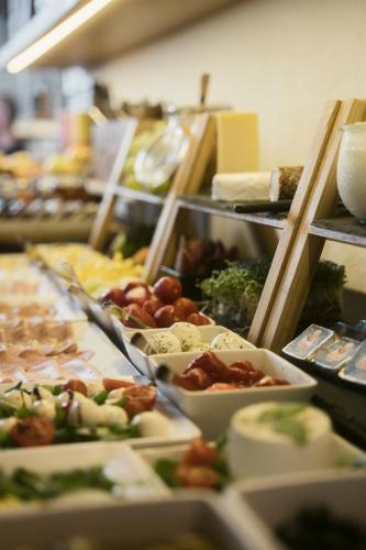 a buffet line with many different types of food at Ölerhof in Haag am Hausruck