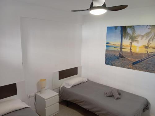 Posteľ alebo postele v izbe v ubytovaní Casa Torremar Playa de San Juan