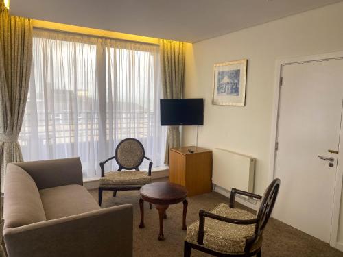 Televisyen dan/atau pusat hiburan di Cavendish Hotel