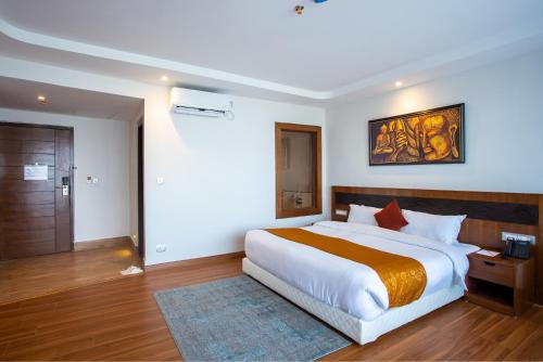 Cama o camas de una habitación en Hotel Sarathi