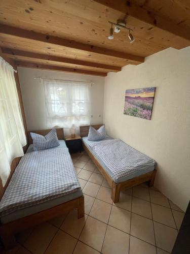 Postel nebo postele na pokoji v ubytování Fewo Hörnlesberg