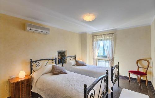 Katil atau katil-katil dalam bilik di Villa Luigi & Luisa