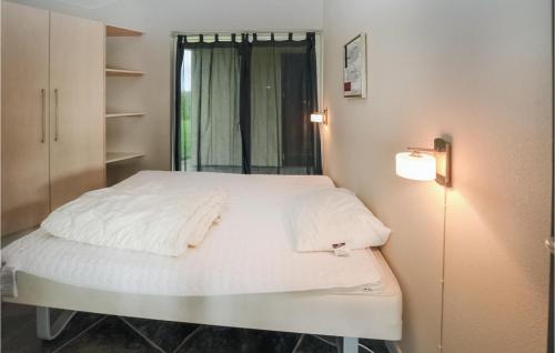 Ένα ή περισσότερα κρεβάτια σε δωμάτιο στο Holiday Home Askemose Vi
