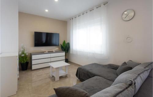 Televízia a/alebo spoločenská miestnosť v ubytovaní Gorgeous Apartment In Jesenice