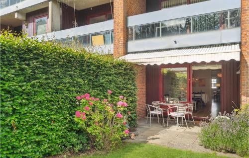 Κήπος έξω από το 1 Bedroom Nice Apartment In Risskov