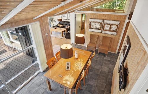 an overhead view of a house with a table and chairs at Holiday Home Hægvej Grenaa Xi in Grenå