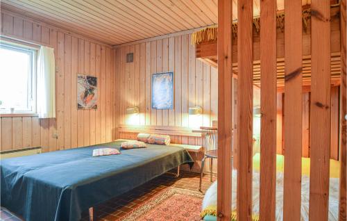 Two-Bedroom Holiday Home In Pandrupにあるベッド