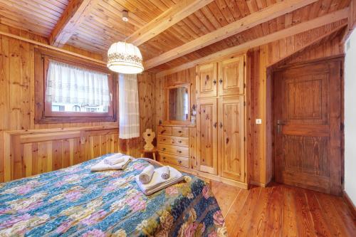 Postel nebo postele na pokoji v ubytování Villa Maria Auronzo