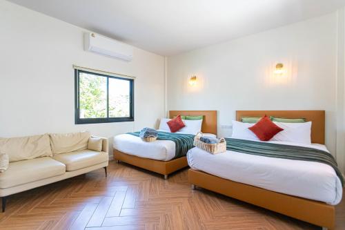 Postel nebo postele na pokoji v ubytování Vawa Guesthouse
