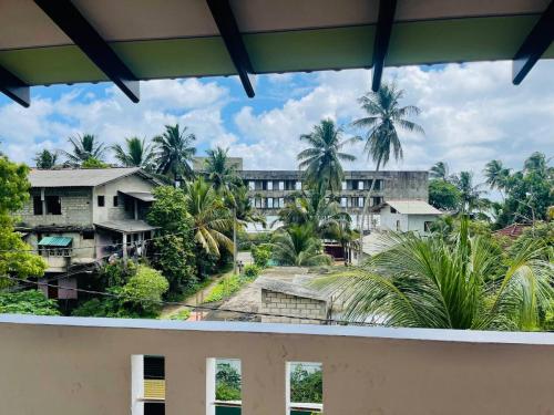 a view from the balcony of a building at Mindiya Turtle Waves Talalla in Talalla