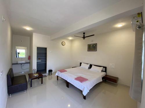 Ένα ή περισσότερα κρεβάτια σε δωμάτιο στο Blackbuck Homestay
