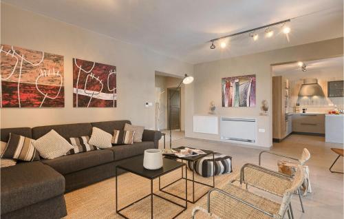 a living room with a couch and a table at Villa Brih Iii in Motovun