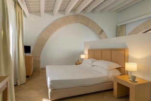 Postel nebo postele na pokoji v ubytování Resort I Mulini