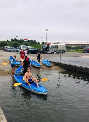 a group of people on kayaks in the water at Dobberhuisje in IJsselstein