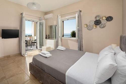 Postel nebo postele na pokoji v ubytování Villa Mediterranean View