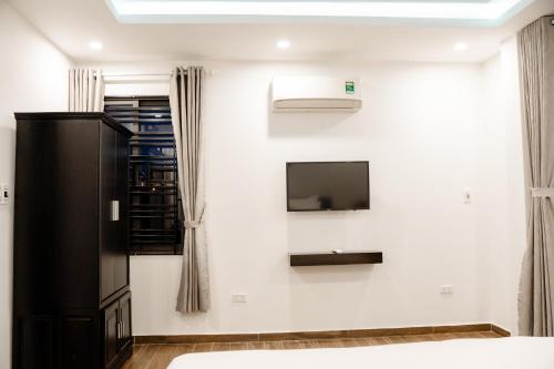 TV a/nebo společenská místnost v ubytování Entire Beach House